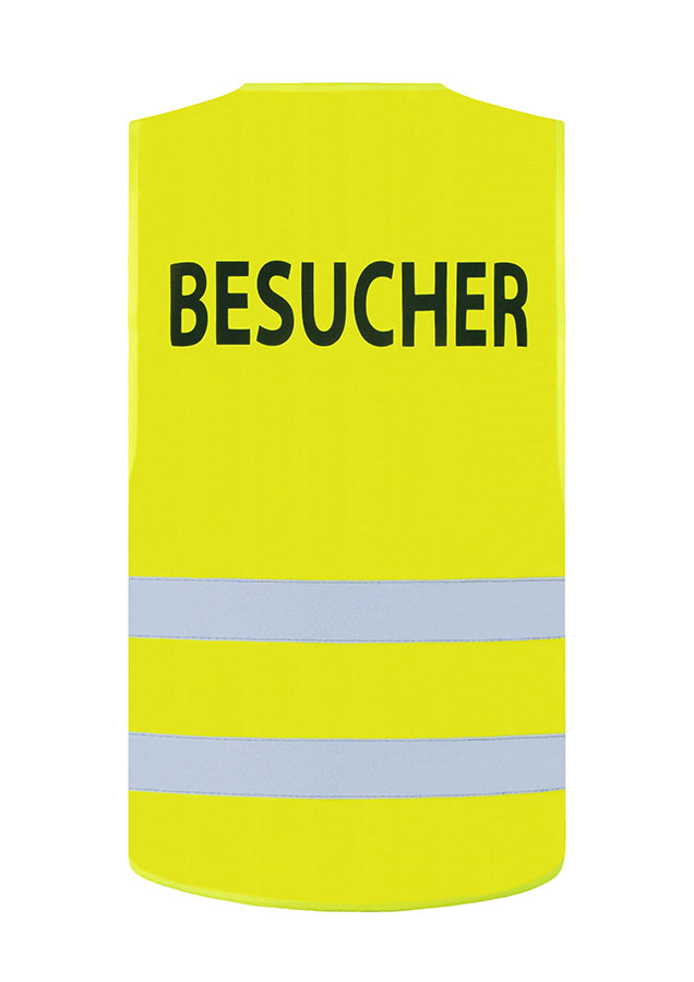 Erwachsener in gelber bedruckbarer Korntex Warnweste in einem industriellen Umfeld