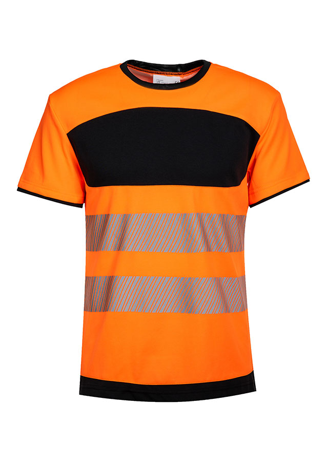 Erwachsener in signalgelbem Korntex-T-Shirt mit schwarzer Brustpartie und Reflexstreifen in einem industriellen Umfeld